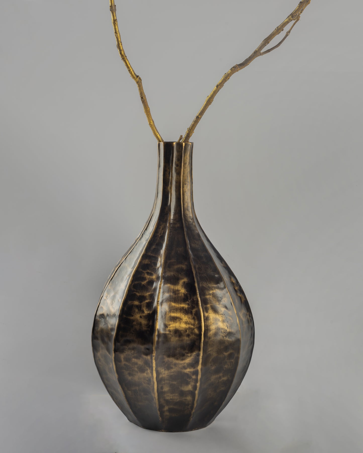 Stria - designer ribbed metal vase for contemporary luxury home decor by OLKAP